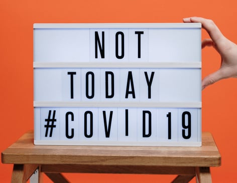 not-today-covid19-sign-on-wooden-stool-